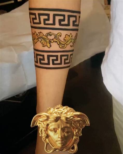 versace löwe tattoo|versace tattoo lettering.